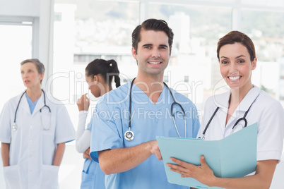 Team of doctors working on their files