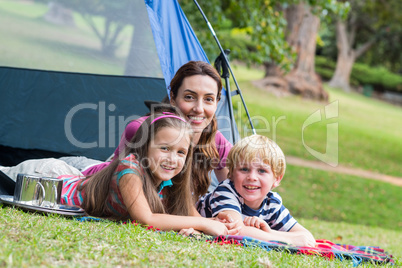 mother and children having fun in the park