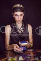 Fortune teller forecasting the future with tarot cards