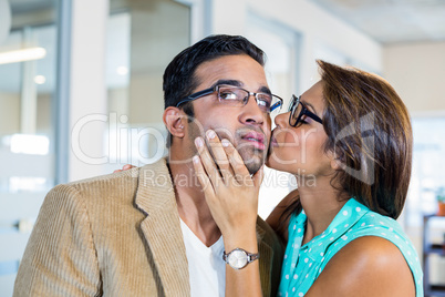 Beautiful brunette kissing her boyfriend