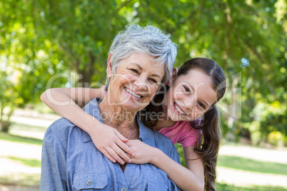 granddaughter and grandmother smilling