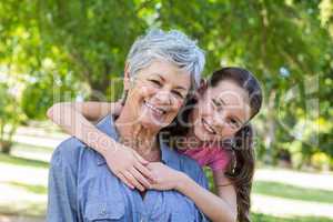 granddaughter and grandmother smilling