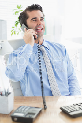 Businessman laughing on the phone