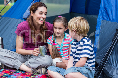 mother and children having fun in the park