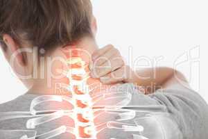 Highlighted spine of woman with neck pain