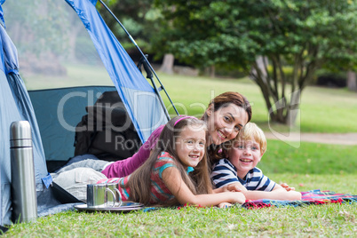 mother and children having fun in the park