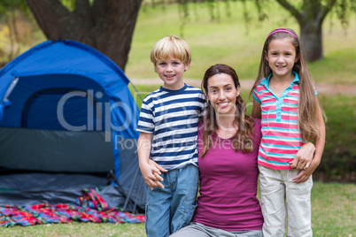 mother and children having fun in the park