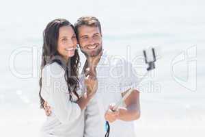 happy couple taking selfie