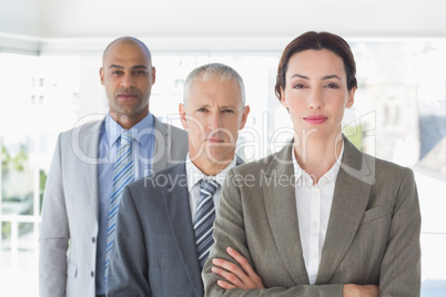 Business colleagues looking at camera