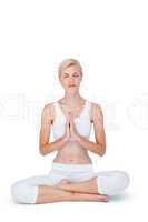 Fit woman meditating eyes closed