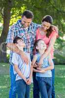 Happy family in the park together