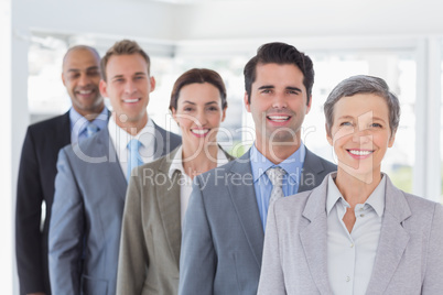 Business people standing in a row