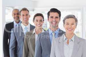 Business people standing in a row