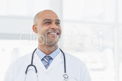 Confident male doctor smiling