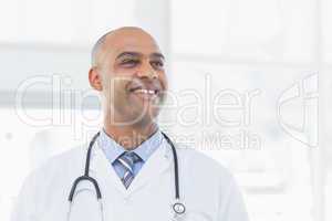 Confident male doctor smiling