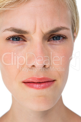 Serious blond woman looking at camera