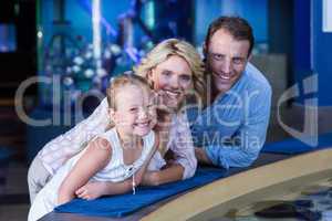 Happy family smiling to camera