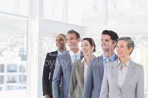 Business people standing in a row