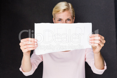 Blonde woman showing help sign