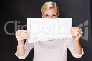 Blonde woman showing help sign