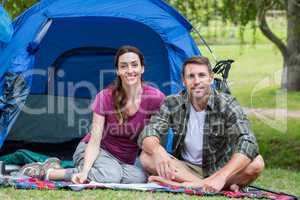 Happy couple smilling in park