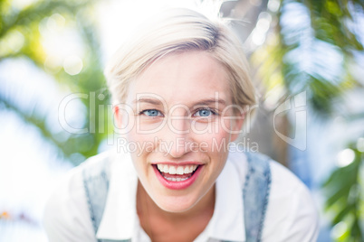 Pretty blonde woman smiling at the camera