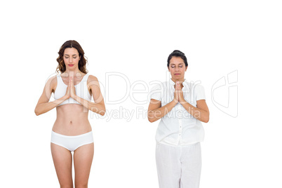 Relaxed women doing yoga