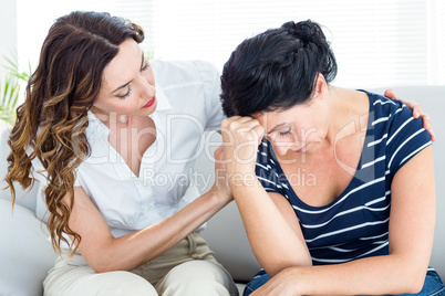 Therapist comforting her patient