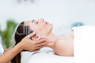 Physiotherapist doing neck massage