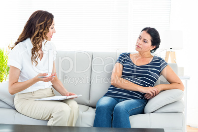 Therapist talking to her patient