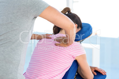 Woman having shoulders massage