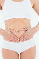 Fit woman suffering stomach pain