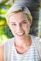 Pretty blonde woman smiling at the camera