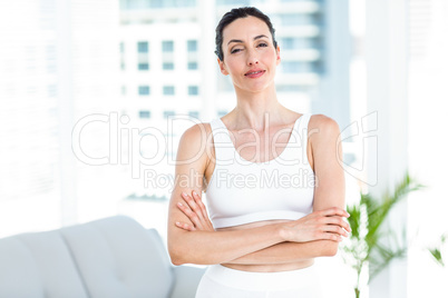 Smiling brunette wearing sportswear