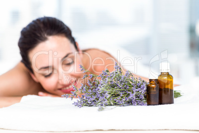 Smiling woman getting an aromatherapy treatment