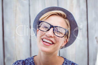 Pretty blonde woman wearing hipster glasses