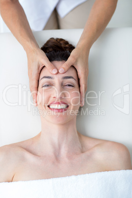 Physiotherapist doing head massage