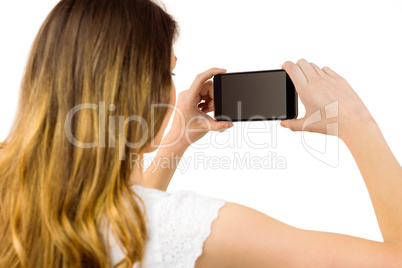 Woman taking a selfie on smartphone