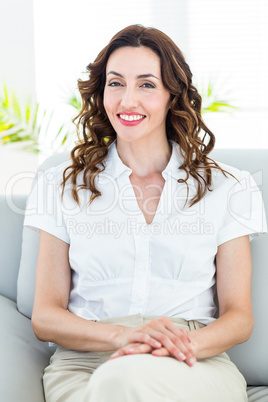 Smiling therapist looking at camera