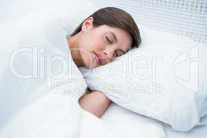 Peaceful brunette sleeping