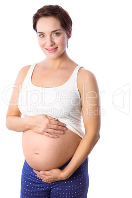 Pregnant woman holding her bump