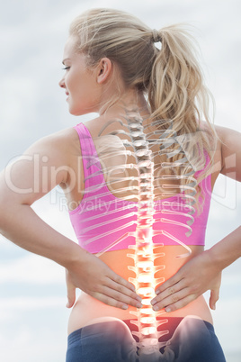 Highlighted spine of woman with back pain