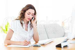 Smiling businesswoman having phone call