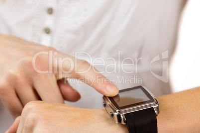 Woman using her smart watch