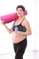 Pregnant woman keeping in shape