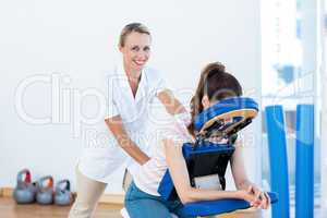 Woman having back massage