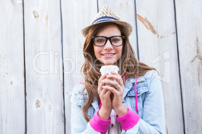 Beautiful woman holding coffee