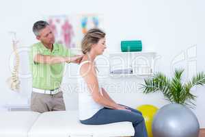 Doctor doing back adjustment