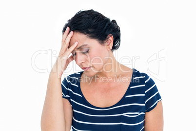 Sad woman sitting with head in hands