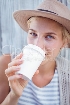 Pretty blonde woman drinking coffee